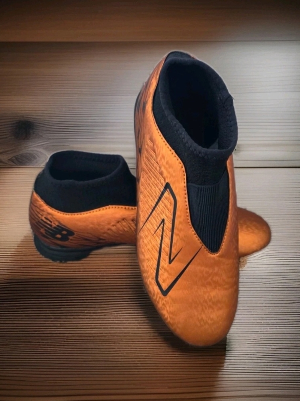New Balance Tekela v4 Magique Junior FG Kids Soccer Cleats Size 5 Copper/Black